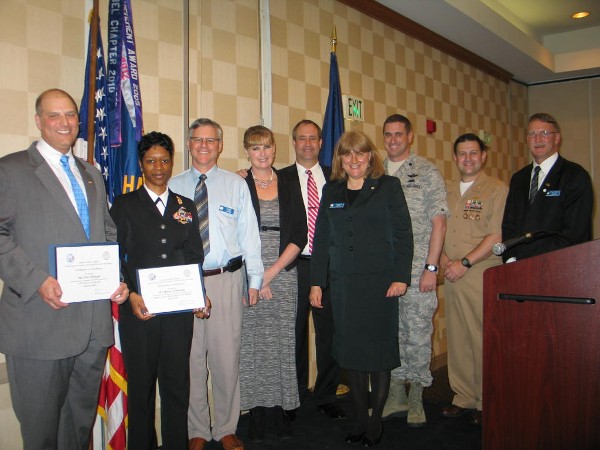 In March, the chapter recognizes awardees (l-r) Pete DiPaola, AFCEAN of the Month (February 2013); Petty Officer First Class Renee Watkins, USN, Military Cyber Professional of the Month; Dr. James Pasch, AFCEAN of the Month; Mrs. Bos alongside her husband Jon Bos, Civilian Cyber Professional of the Month; while Duvall; Col. Messer; Lt. Cmdr. Dave Pereira, USN, chapter vice president of military affairs; and Doug Vanderlip, chapter executive vice president, stand witness.